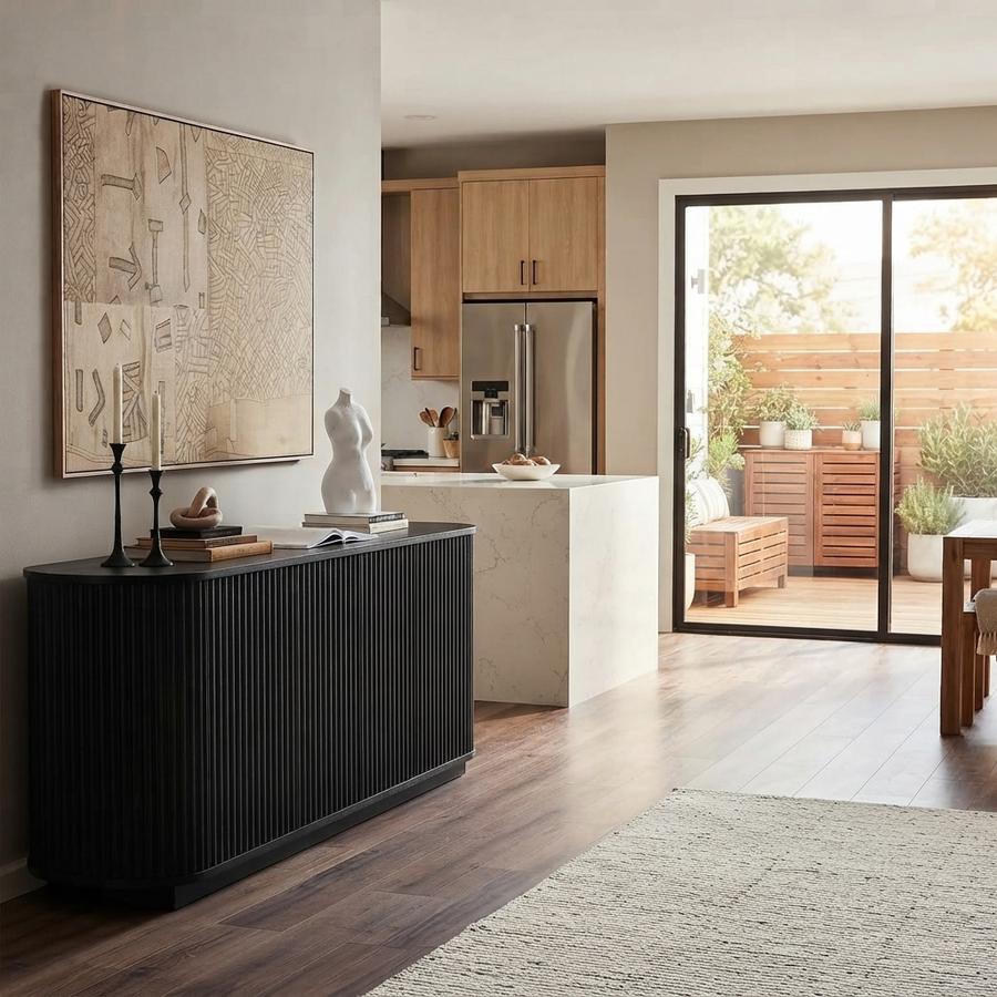 Fluted sideboard against a living-room wall under a mirror